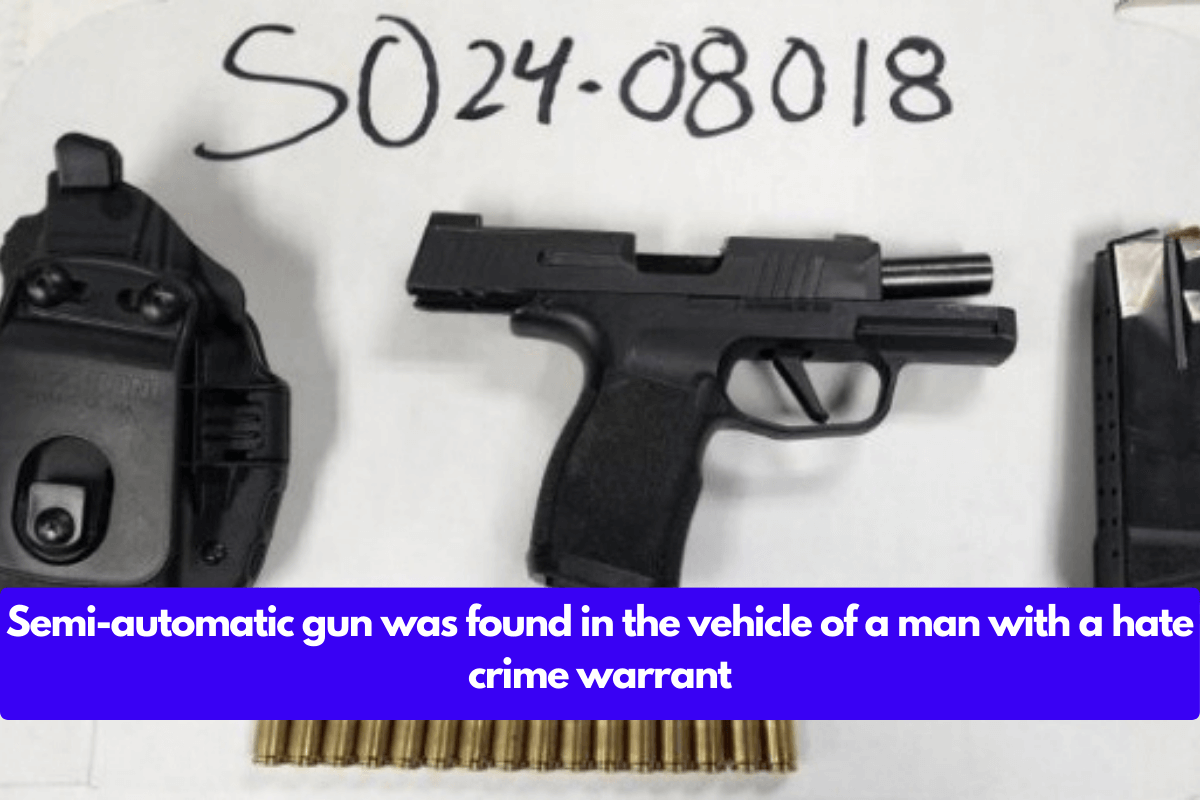 Semi-automatic gun was found in the vehicle of a man with a hate crime warrant